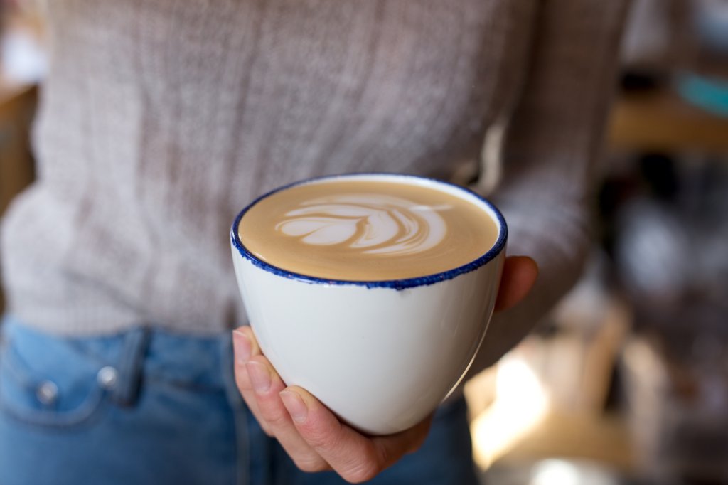 a cup of barista style coffee.